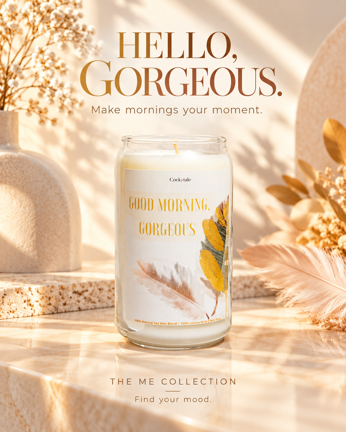 CockyTale Good Morning, Gorgeous candle in a tall clear glass jar with cream wax, gold lettering and feather illustrations.